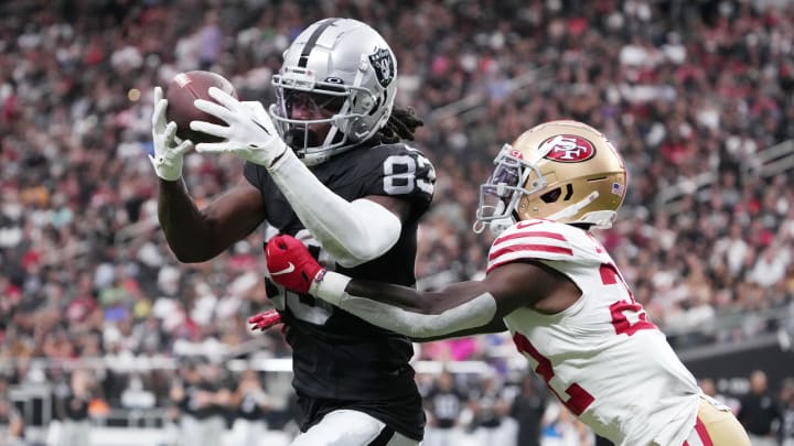 Aug 13, 2023; Paradise, Nevada, USA; Las Vegas Raiders wide receiver Kristian Wilkerson (83) catches the ball against San Francisco 49ers cornerback D'Shawn Jamison (22) in the second half at Allegiant Stadium. Mandatory Credit: Kirby Lee-USA TODAY Sports