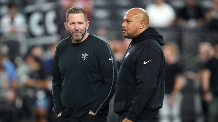 Aug 23, 2024; Paradise, Nevada, USA; Las Vegas Raiders coach Antonio Pierce (right) and pass game coordinator Scott Turner during the San Francisco 49ers in the first half at Allegiant Stadium. Mandatory Credit: Kirby Lee-USA TODAY Sports