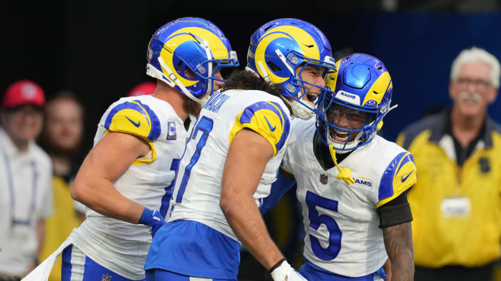 Dec 3, 2023; Inglewood, California, USA;Los Angeles Rams wide receiver Puka Nacua (17) celebrates with wide receiver Cooper Kupp (10) and wide receiver Tutu Atwell (5) after scoring on a 70-yard touchdown reception against the Cleveland Browns in the first half at SoFi Stadium. Mandatory Credit: Kirby Lee-USA TODAY Sports