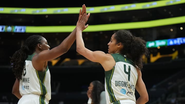 Sep 11, 2024; Los Angeles, California, USA; Seattle Storm forward Nneka Ogwumike (3) and guard Skylar Diggins-Smith (4) celebrate against the LA Sparks in the second half at Crypto.com Arena. 