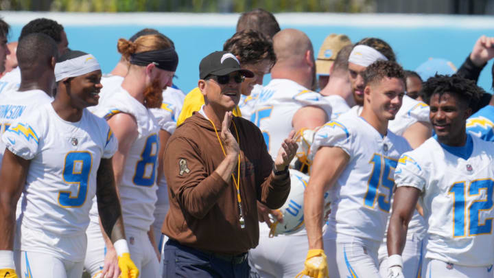 Jun 13, 2024; Costa Mesa, CA, USA; Los Angeles Chargers head coach Jim Harbaugh interacts with his team during minicamp at the Hoag Performance Center.  Mandatory Credit: Kirby Lee-USA TODAY Sports