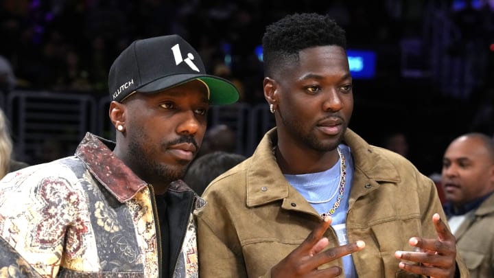 Jan 17, 2024; Los Angeles, California, USA; Rich Paul (left) and Mark Phillips pose during the game between the Los Angeles Lakers and the Dallas Mavericks at Crypto.com Arena.