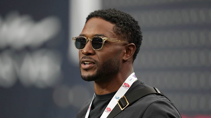 Reggie Bush watches the USC Trojans’ season-opening game against the LSU Tigers at Allegiant Stadium in Las Vegas.