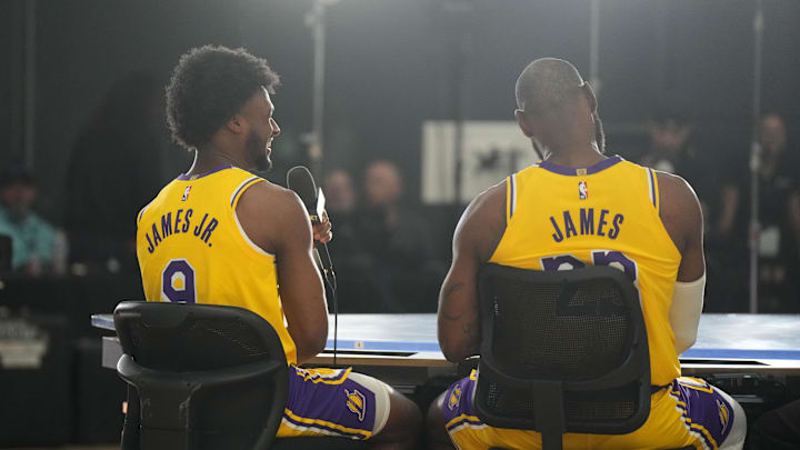 Sep 30, 2024; El Segundo, CA, USA; Los Angeles Lakers forward LeBron James (23) with son Bronny James (9) during media day at the UCLA Health Training Center. Sep 30, 2024; El Segundo, CA, USA; Los Angeles Lakers forward LeBron James (23) with son Bronny James (9) during media day at the UCLA Health Training Center.