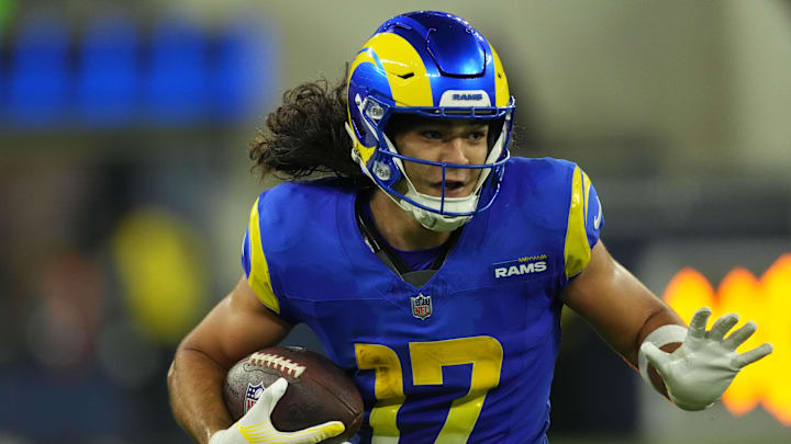 Nov 11, 2024; Inglewood, California, USA; Los Angeles Rams wide receiver Puka Nacua (17) carries the ball against the Miami Dolphins at SoFi Stadium. Mandatory Credit: Kirby Lee-Imagn Images