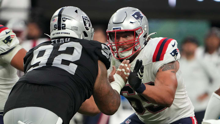 The New England Patriots declined the fifth-year club option on offensive lineman Cole Strange.