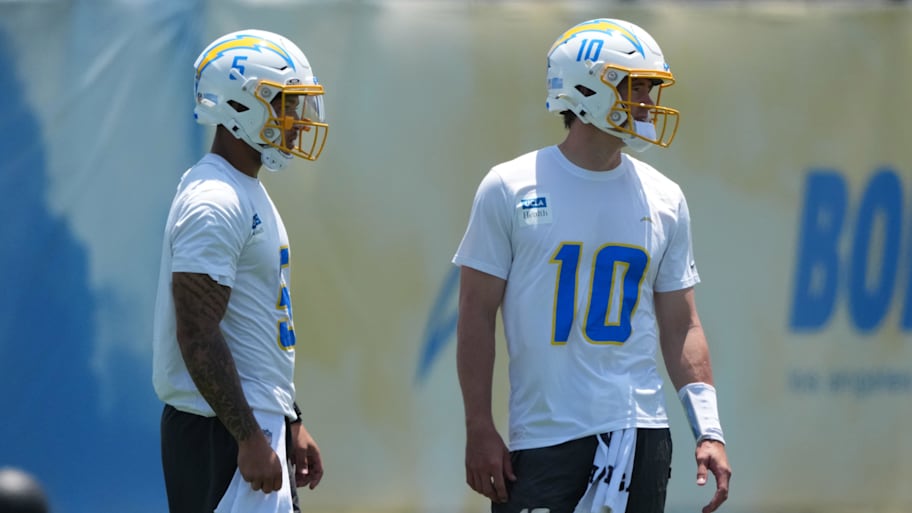 Los Angeles Chargers quarterbacks Trey Lance (5) and Justin Herbert (10) during organized team activities at The Bolt.  | Kirby Lee-Imagn Images