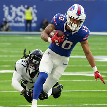Oct 8, 2023; London United Kingdom; Buffalo Bills wide receiver Khalil Shakir (10) is pursued by Jacksonville Jaguars cornerback Tre Herndon (37) during the second half of an NFL International Series game at Tottenham Hotspur Stadium