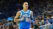 Mar 8, 2025; Los Angeles, California, USA; UCLA Bruins guard Kobe Johnson (0) reacts in the second half against the Southern California Trojans at Pauley Pavilion presented by Wescom. Mandatory Credit: Kirby Lee-Imagn Images