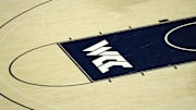 Mar 23, 2024; Spokane, Washington, USA; The West Coast Conference (WCC) logo on the court  at McCarthey Athletic Center. Mandatory Credit: Kirby Lee-Imagn Images