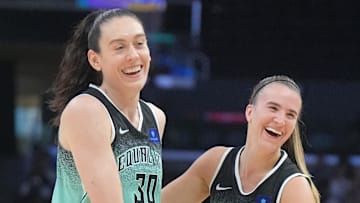 Aug 15, 2024; Los Angeles, California, USA; New York Liberty forward Breanna Stewart (30) and guard Sabrina Ionescu (20) celebrate in the first half against the LA Sparks Crypto.com Arena. Mandatory Credit: Kirby Lee-Imagn Images