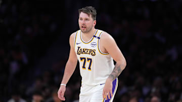 Mar 16, 2025; Los Angeles, California, USA; Los Angeles Lakers guard Luka Doncic (77) reacts against the Phoenix Suns in the second half at Crypto.com Arena. Mandatory Credit: Kirby Lee-Imagn Images