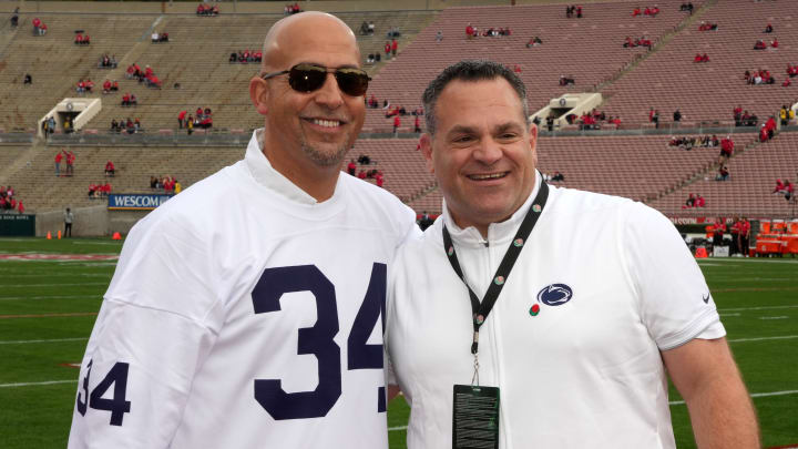 Penn State Athletic Director Patrick Kraft (right) poses with football coach James Franklin before the 2023 Rose Bowl.