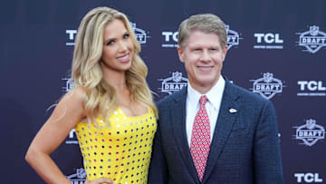 Kansas City Chiefs chairman Clark Hunt and daughter Gracie Hunt pose on the red carpet for the NFL Draft. 