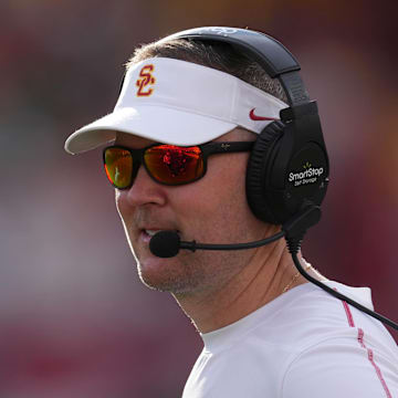 Nov 30, 2024; Los Angeles, California, USA; Southern California Trojans head coach Lincoln Riley reacts against the Notre Dame Fighting Irish in the second half at United Airlines Field at Los Angeles Memorial Coliseum. Mandatory Credit: Kirby Lee-Imagn Images