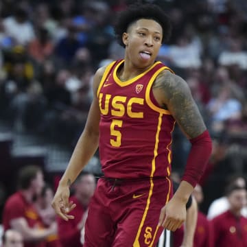 Mar 13, 2024; Las Vegas, NV, USA; Southern California Trojans guard Boogie Ellis (5) reacts after a three-point basket against the Washington Huskies at T-Mobile Arena. Mandatory Credit: Kirby Lee-USA TODAY Sports