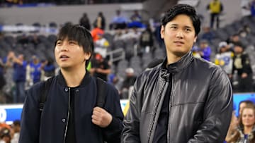 Dec 21, 2023; Inglewood, California, USA; Los Angeles Dodgers player Shohei Ohtani (right) and interpreter Ippei Mizuhara attend the game between the Los Angeles Rams and the New Orleans Saints at SoFi Stadium. Mandatory Credit: Kirby Lee-Imagn Images