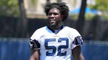 Dallas Cowboys guard Tyler Booker (52)