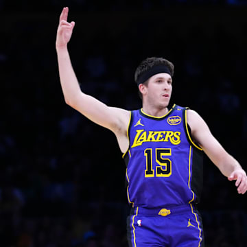 Mar 17, 2025; Los Angeles, California, USA; Los Angeles Lakers guard Austin Reaves (15) gestures after a three-point basket against the San Antonio Spurs in the first half at Crypto.com Arena. Mandatory Credit: Kirby Lee-Imagn Images