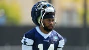 Jul 29, 2023; Oxnard, CA, USA; Dallas Cowboys linebacker Jabril Cox (14) wears a Guardian helmet cap during training camp at the River Ridge Fields. Mandatory Credit: Kirby Lee-USA TODAY Sports