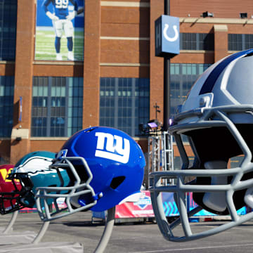 Feb 28, 2024; Indianapolis, IN, USA; A general view of large Dallas Cowboys and New York Giants helmets at the NFL Scouting Combine Experience at Lucas Oil Stadium. Mandatory Credit: Kirby Lee-Imagn Images