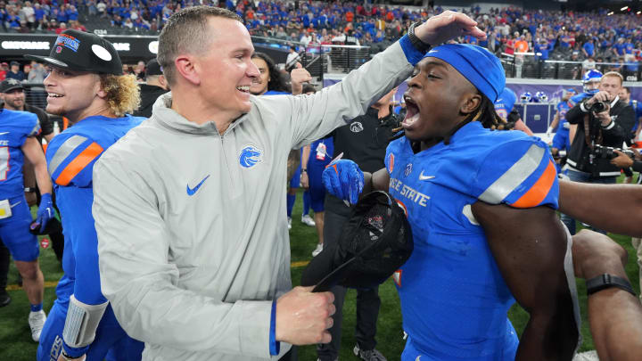 Dec 2, 2023; Las Vegas, NV, USA; Boise State Broncos head coach Spencer Danielson celebrates with running back Ashton Jeanty (2) after 44-20 victory over the UNLV Rebels in the Mountain West Championship at Allegiant Stadium. Mandatory Credit: Kirby Lee-USA TODAY Sports