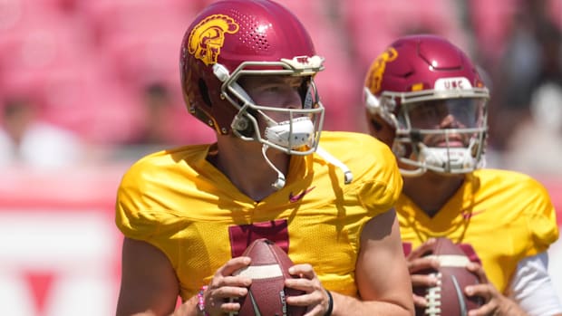 Southern California Trojans quarterbacks Miller Moss (7) and Caleb Williams 