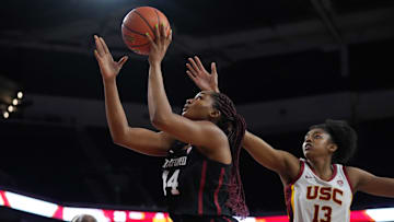 Jan 15, 2023; Los Angeles, California, USA; Stanford Cardinal forward Kiki Iriafen (44) shoots the ball against Southern California Trojans forward Rayah Marshall (13) in the first half at Galen Center.  USC defeated Stanford 55-46. Mandatory Credit: Kirby Lee-Imagn Images