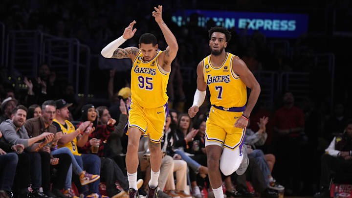 Jan 16, 2023; Los Angeles, California, USA; Los Angeles Lakers forward Juan Toscano-Anderson (95) and forward Troy Brown Jr. (7) react after a three-point basket ba Toscano-Anderson against the Houston Rockets in the first half at Crypto.com Arena. Mandatory Credit: Kirby Lee-Imagn Images