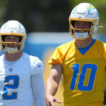 May 29, 2024; Costa Mesa, CA, USA; Los Angeles Chargers quarterback Justin Herbert (10) and quarterback Easton Stick (2) during organized team activities at Hoag Performance Center. Mandatory Credit: Kirby Lee-USA TODAY Sports