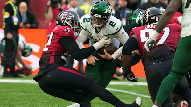 Zach Wilson is unable to scramble away from Grady Jarrett in a Falcons game with the Jets.