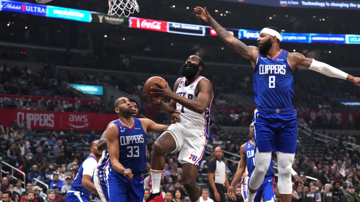 Jan 17, 2023; Los Angeles, California, USA; Philadelphia 76ers guard James Harden (1) shoots the ball against LA Clippers forward Nicolas Batum (33) and forward Marcus Morris Sr. (8) in the first half at Crypto.com Arena. Mandatory Credit: Kirby Lee-USA TODAY Sports