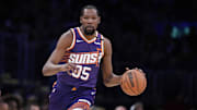 Mar 16, 2025; Los Angeles, California, USA; Phoenix Suns forward Kevin Durant (35) dribbles the ball against the Los Angeles Lakers in the second half at Crypto.com Arena. Mandatory Credit: Kirby Lee-Imagn Images