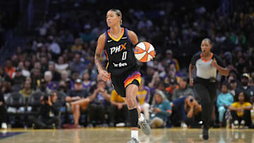 Phoenix Mercury guard Natasha Cloud (0) dribbles the ball against the LA Sparks in the first half at Crypto.com Arena.