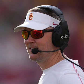 Nov 30, 2024; Los Angeles, California, USA; Southern California Trojans head coach Lincoln Riley reacts against the Notre Dame Fighting Irish in the second half at United Airlines Field at Los Angeles Memorial Coliseum. Mandatory Credit: Kirby Lee-Imagn Images