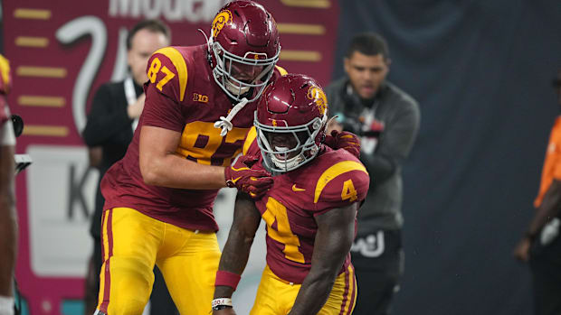 McRee and Marks celebrate in the end zone