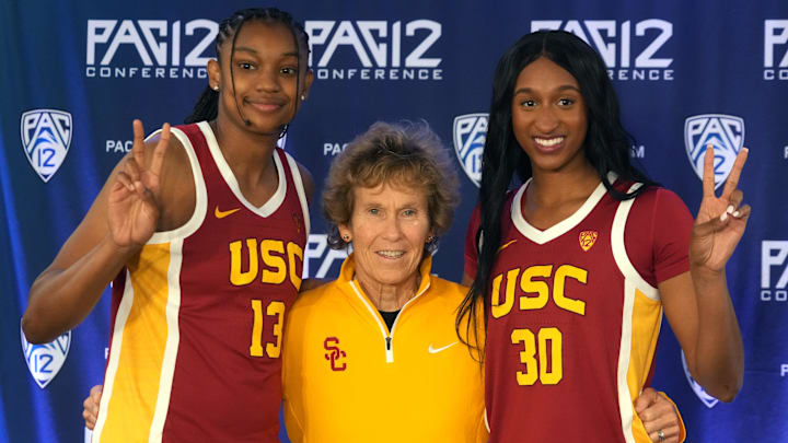 Oct 25, 2022; San Francisco, CA, USA; Southern California Trojans center Rayah Marshall (13) and forward Kadi
Sissoko (30) pose with associate head coach Beth Burns (center) during Pac-12 Women's Basketball Media Day at the Pac-12 Network Studios. Mandatory Credit: Kirby Lee-Imagn Images