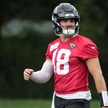 Oct 16, 2024; Watford, United Kingdom; Jacksonville Jaguars quarterback John Rhys Plumlee (18) during practice at The Grove. Mandatory Credit: Kirby Lee-Imagn Images