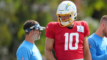 Aug 1, 2022; Costa Mesa, CA, USA; Los Angeles Chargers quarterback Justin Herbert (10) speaks with
