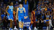 Mar 8, 2025; Los Angeles, California, USA; UCLA Bruins forward Tyler Bilodeau (34) and guard Dylan Andrews (2) celebrate in the first half against the Southern California Trojans at Pauley Pavilion presented by Wescom. Mandatory Credit: Kirby Lee-Imagn Images