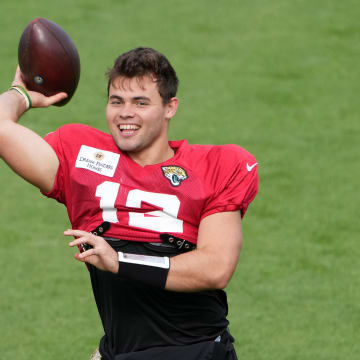 Oct 4, 2023; Ware, United Kingdom; Jacksonville Jaguars quarterback Nathan Rourke (12) throws the ball during practice at Hanbury Manor Marriott Hotel.  