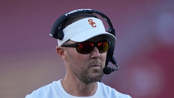 Oct 21, 2023; Los Angeles, California, USA; Southern California Trojans head coach Lincoln Riley watches from the sidelines against the Utah Utes in the first half at United Airlines Field at Los Angeles Memorial Coliseum. Mandatory Credit: Kirby Lee-Imagn Images