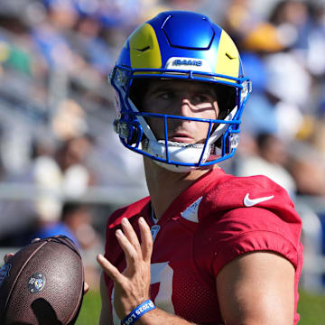 Jul 23, 2025; Los Angeles, CA, USA; Los Angeles Rams quarterback Stetson Bennett (13) throws the ball during training camp at Loyola Marymount University. Mandatory Credit: Kirby Lee-Imagn Images