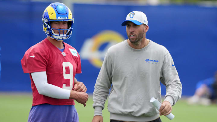 Los Angeles Rams quarterback Matthew Stafford and quarterbacks coach Dave Ragone during organized NFL team activities Los Angeles Rams quarterback Matthew Stafford and quarterbacks coach Dave Ragone during organized NFL team activities
