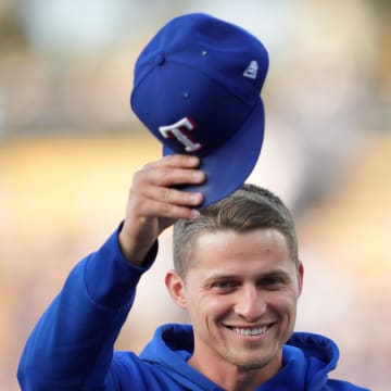 Jun 11, 2024; Los Angeles, California, USA; Texas Rangers infielder Corey Seager is recognized before the game against the Los Angeles Dodgers at Dodger Stadium. Mandatory Credit: Kirby Lee-USA TODAY Sports