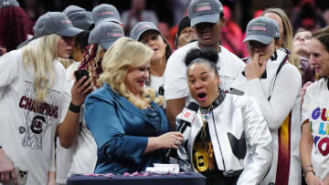 South Carolina basketball coach Dawn Staley and her team celebrating their most recent National Championship