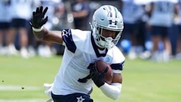 Jul 22, 2025; Oxnard, CA, USA; Dallas Cowboys receiver Traeshon Holden carries the ball during training camp at the River Ridge Fields. Mandatory Credit: Kirby Lee-Imagn Images