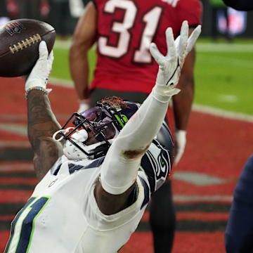 Seahawks receiver Marquise Goodwin (11) celebrates a TD against the Buccaneers in Germany in 2022.
