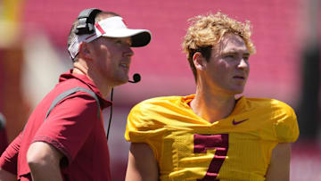 Apr 23, 2022; Los Angeles, CA, USA; Southern California Trojans coach Lincoln Riley (left) talks with quarteback Miller Moss (7) during the spring game at the Los Angeles Memorial Coliseum. Mandatory Credit: Kirby Lee-USA TODAY Sports