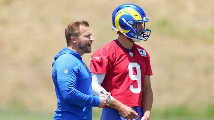May 21, 2024, Thousand Oaks, California, USA; Los Angeles Rams coach Sean McVay (left) talks with quarterback Matthew Stafford (9) during organized team activities at Cal Lutheran University. Mandatory Credit: Kirby Lee-USA TODAY Sports